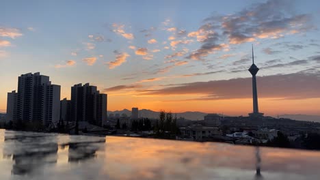 sunrise tehran iran early morning in asia wide view landscape from city scenic moment silhouette tower people life building in old city down town modern life in air pollution turkey clear clean sky