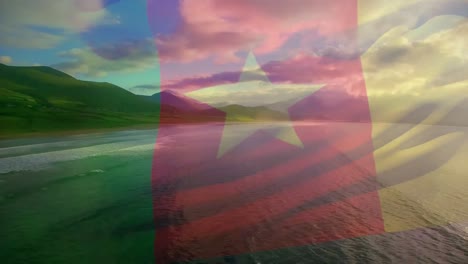 animation of flag of cameroon blowing over seascape