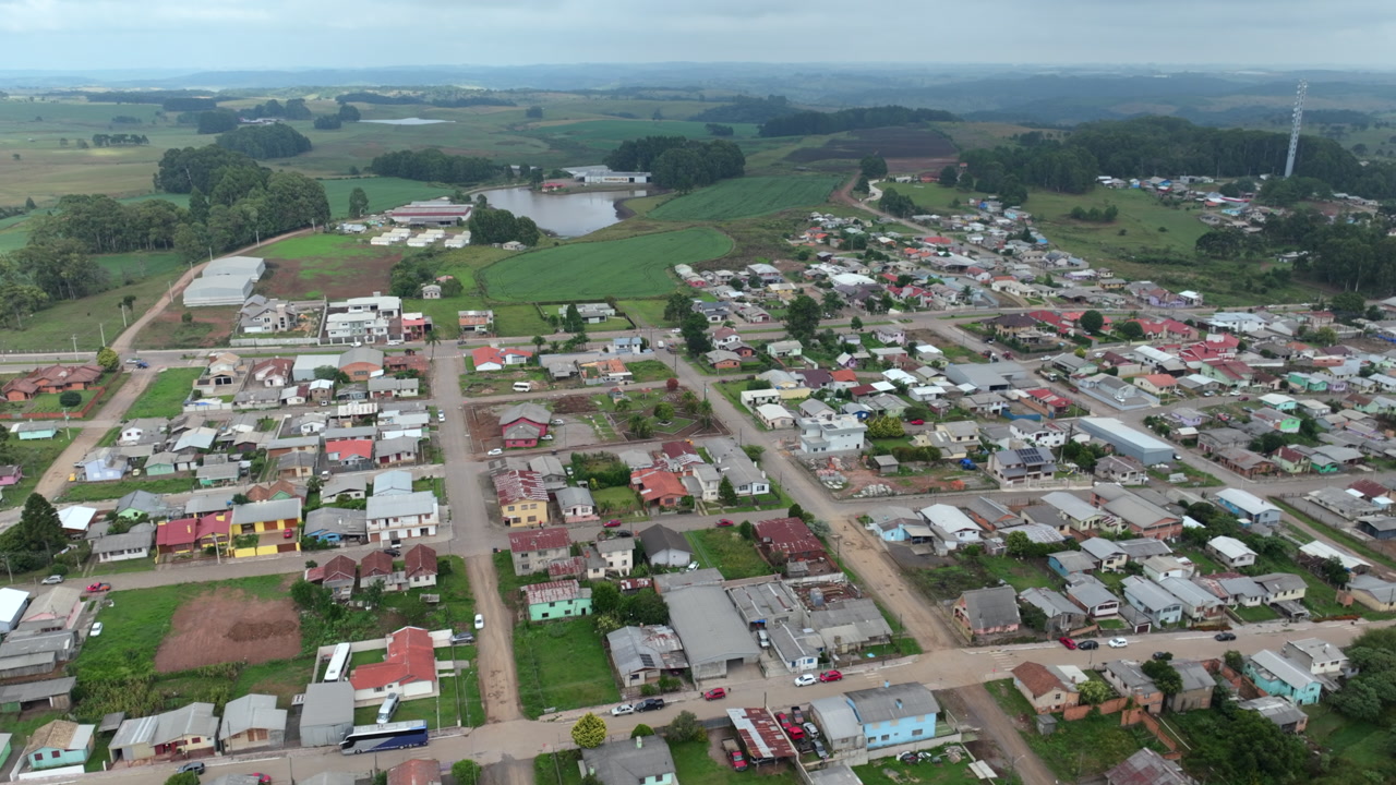 Bom Jesus aerial panorama sweeping across neighborhoods, streets and rural surroundings in southern Brazil