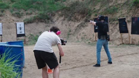 cameraman capture gunshots at olesko shooting range during target practice