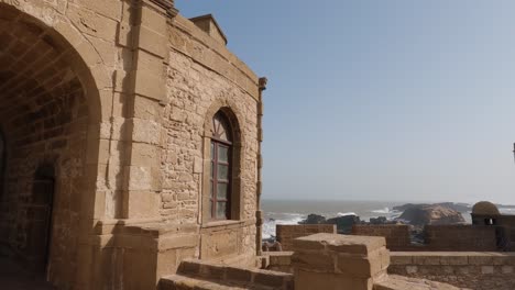 view from skala de la ville onto ocean, waves crashing