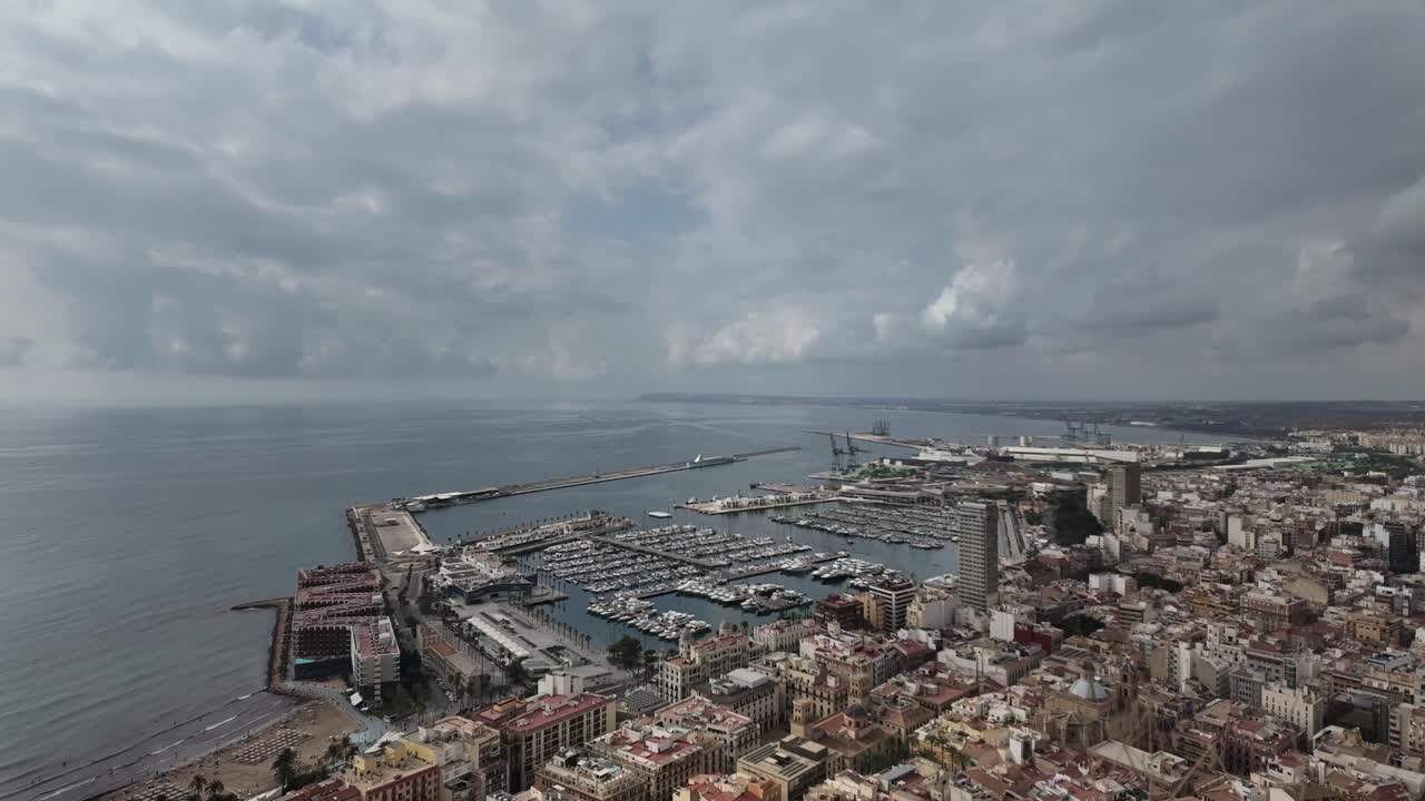 Aerial View of a Coastal City with Harbor and Marina