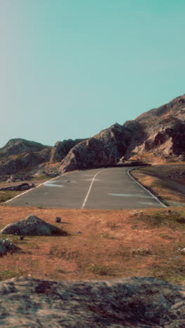 a winding road through the mountains