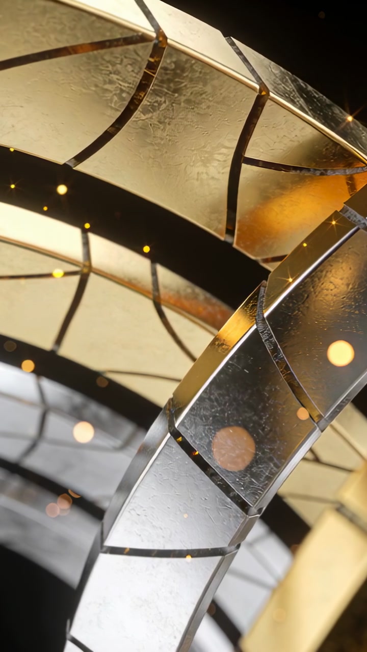 Vertical video: Shifting camera revealing metallic concentric rings in studio, highlighting rivets
