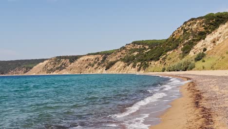 cinematic sea and ocean waves glide across the sand