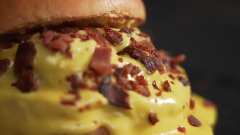 juicy and tasty burger with bacon and melted american cheese