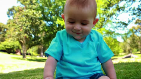 Cute-baby-boy-playing-with-sunhat