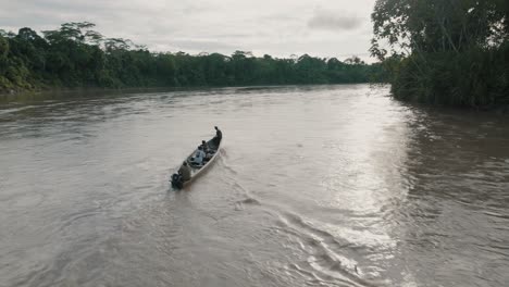 Boat-With-Tourists-Touring-The-Amazon-River-In-Ecuador---aerial-drone-shot