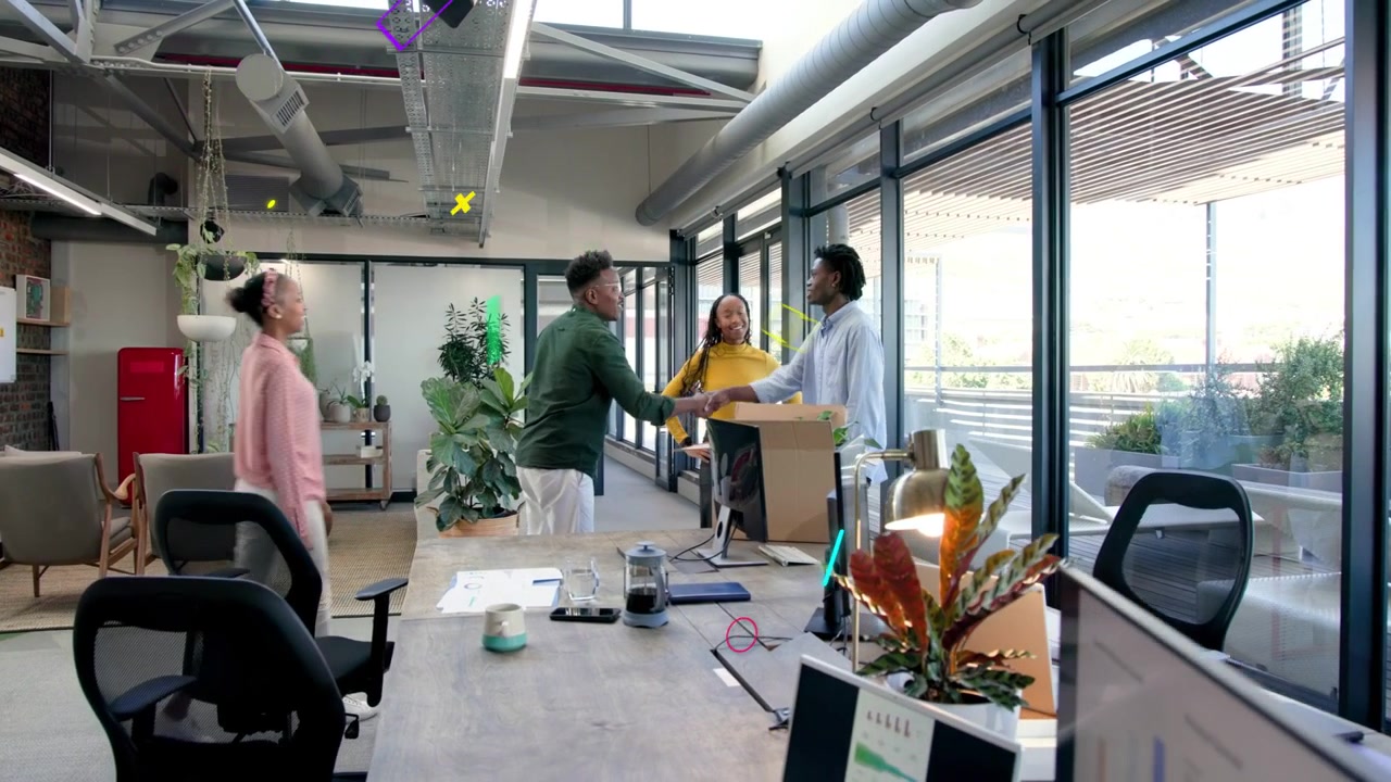 Vertical video: New hire with box sparking team standing shaking hands huddling for business start