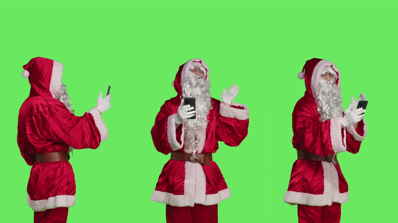 Santa Claus using phone on green screen
