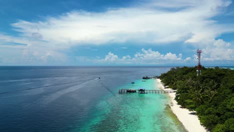 Aerial-of-turquoise-coast-of-paradise-romantic-secluded-island-on-the-coast-of-Malaysia