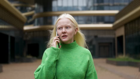 albino woman walking on the street