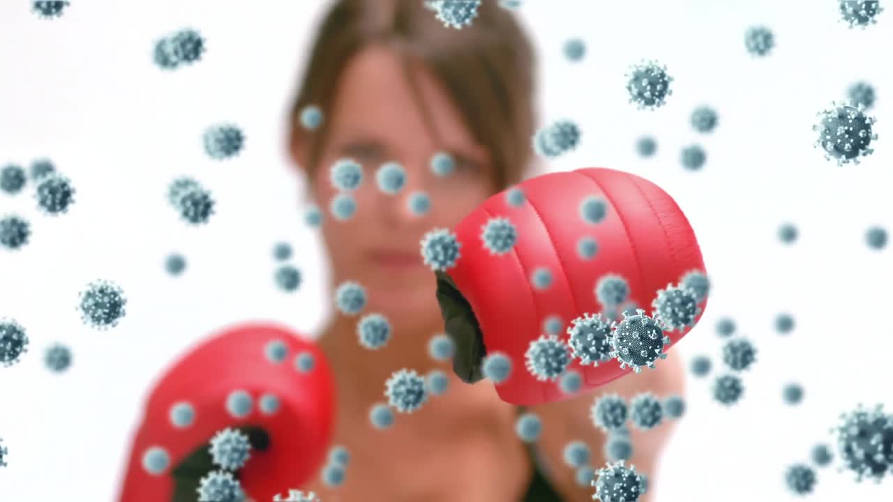animación de células de virus sobre la mujer caucásica boxeo