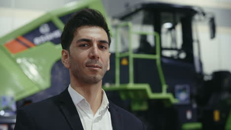 businessman at agriculture machinery exhibition
