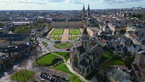 caen town hall, historic eglise saint-étienne-le-vieux church ruins, abbaye aux hommes or abbey men, cityscape, france. aerial drone lateral