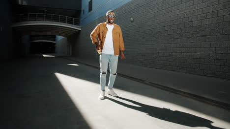 man dancing in urban setting