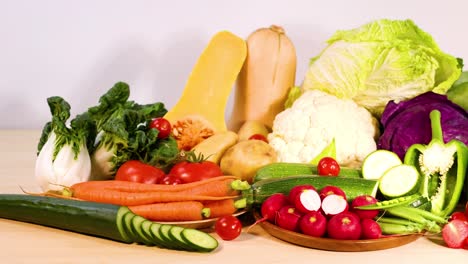 assorted vegetables arranged on a white background