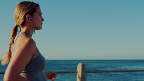 Fitness,-pregnant-or-woman-running-with-music