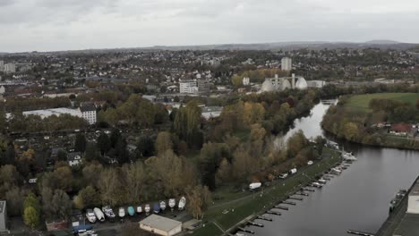 Drone-Aerial-Shot-of-the-yacht-harbour-in-the-city-center-of-Kassel-in-Germany,-Hessen,-Europe