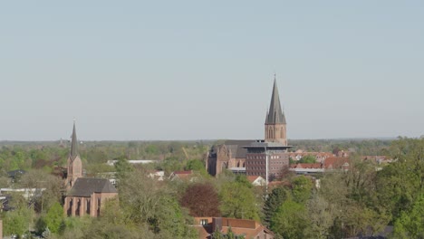 city center in north germany papenburg with two churches on a beautiful spring day