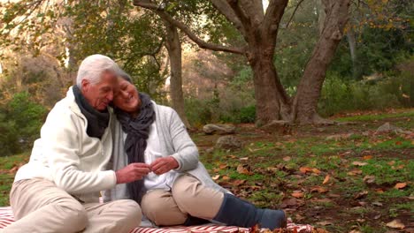 Mature-couple-sitting-together