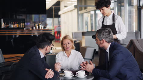 businesspeople meeting in a cafe