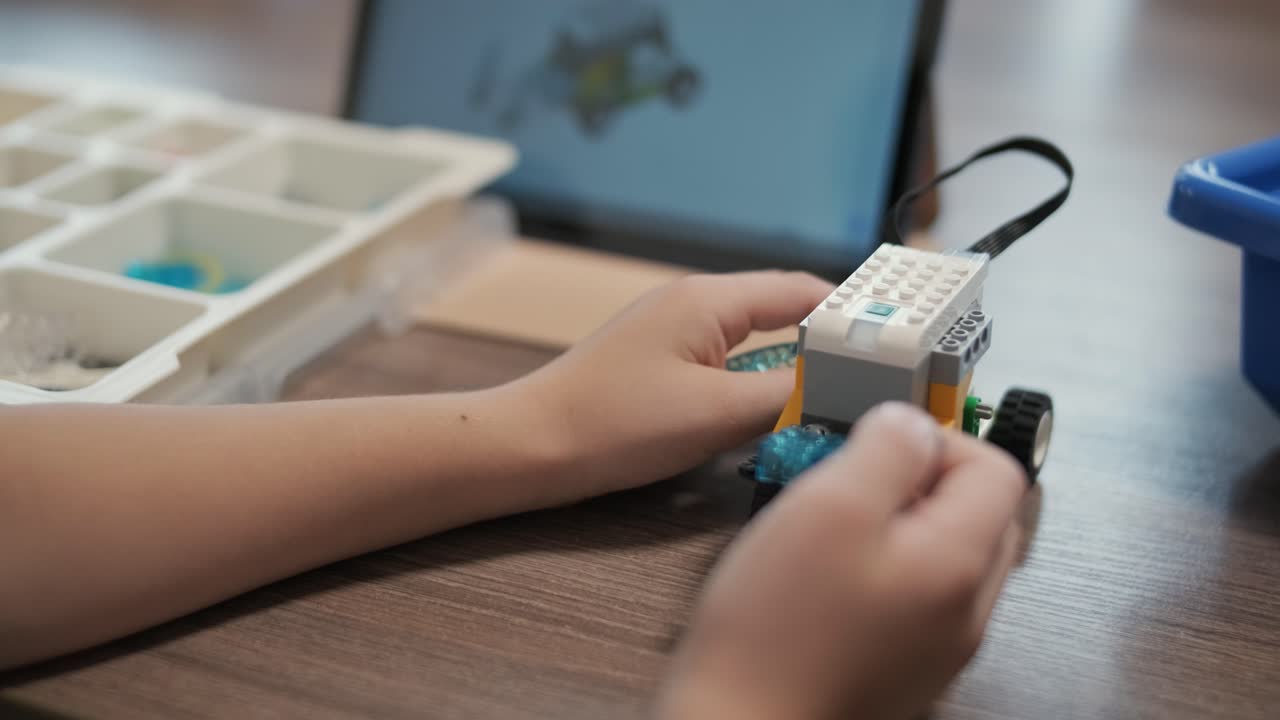 Happy smiling boys having fun in workshop