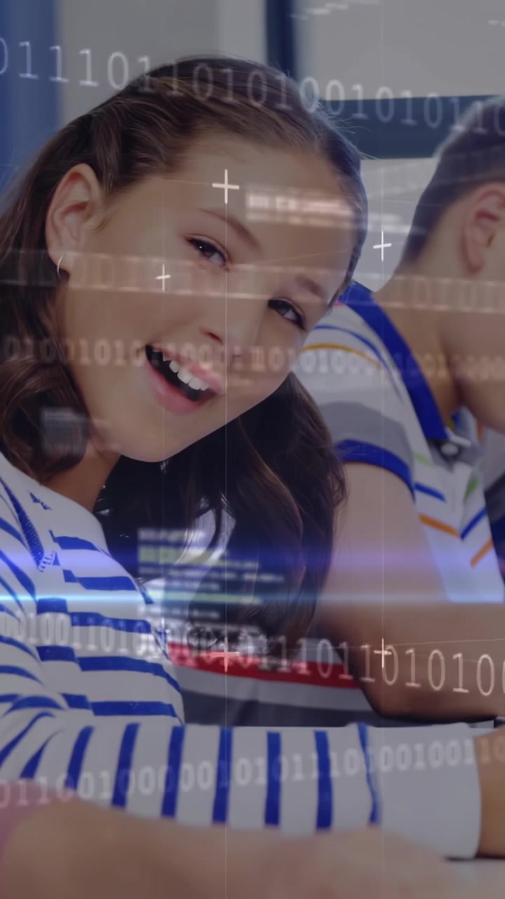 Vertical video: Teen girl looking up at camera, smiling while binary scan overlaying school notes