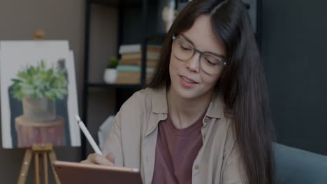 woman working on digital art tablet