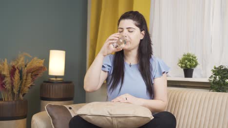 woman drinking water for healthy life.