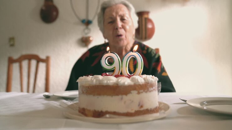 Senior female celebrating birthday with family