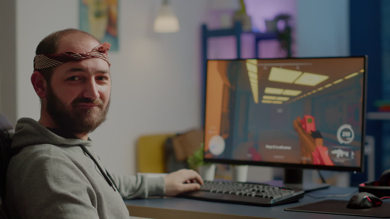 Pro cyber man looking at camera before playing space shooter games