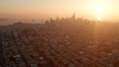 rising aerial shot over downtown san francisco at sunrise