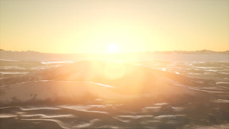 red sand desert dunes at sunset