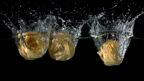 Taglietelle-nests-falling-into-water