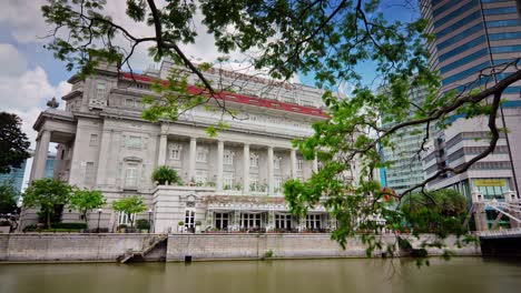 sunny day singapore city famous old hotel bay panorama 4k time lapse