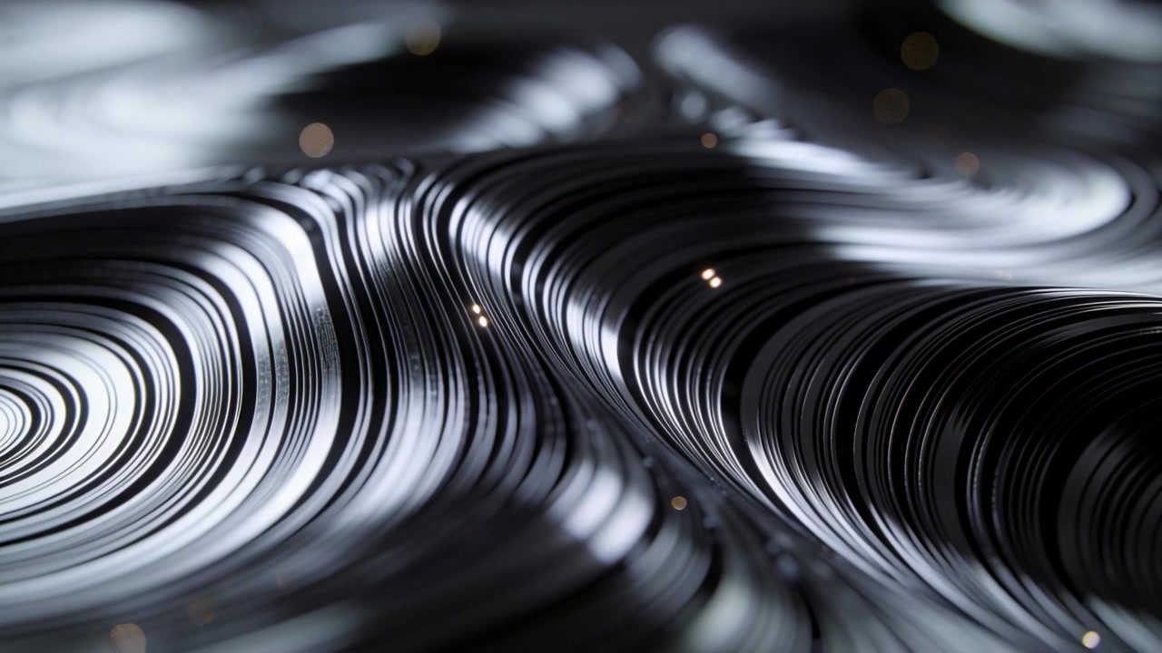 Pulsing light making glossy layered ridges rippling in studio macro flecks tracing peaks