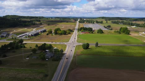 road intersection and green landscape of michigan, aerial view