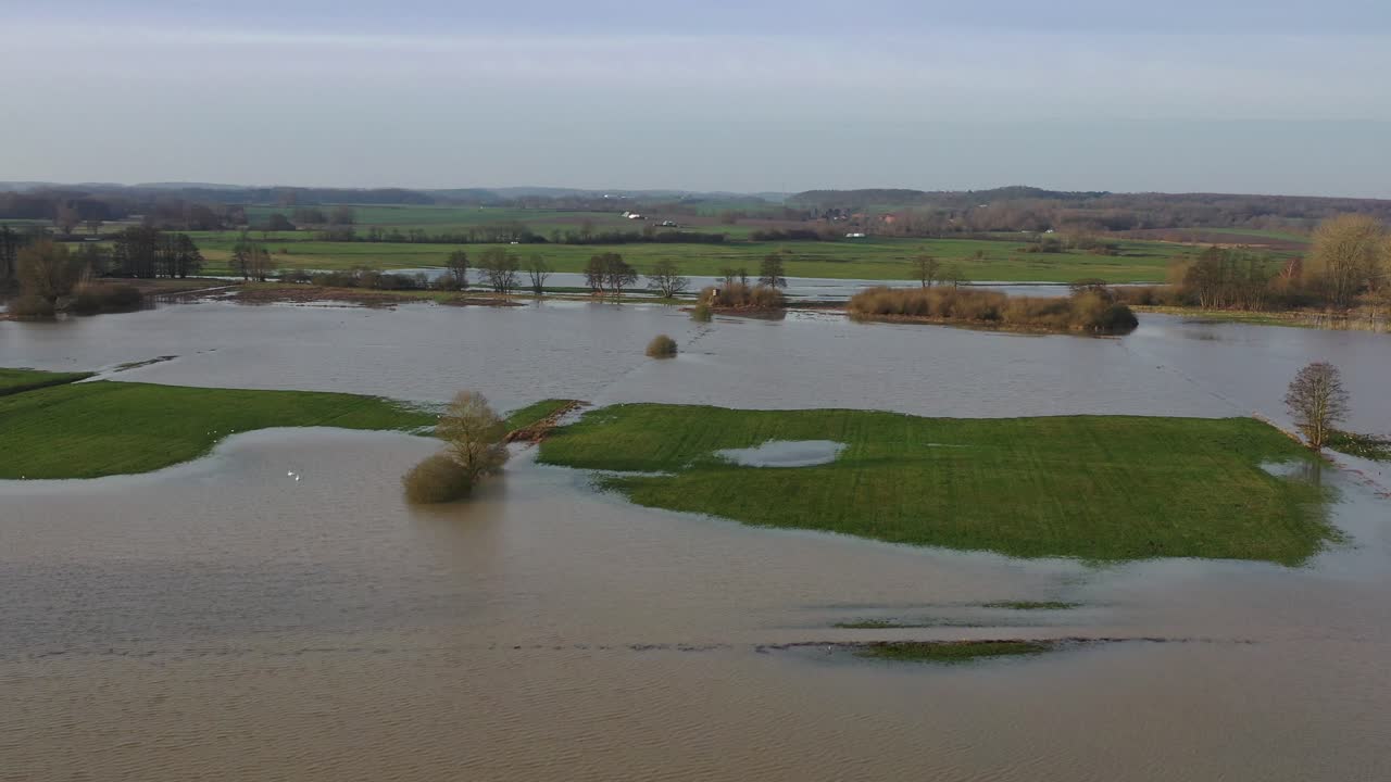 a drone flight over meadows and fields, which were flooded after heavy rain