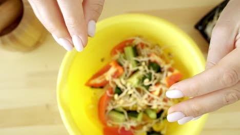 preparing a salad with bean sprouts