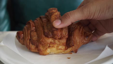 croissant and empty plate