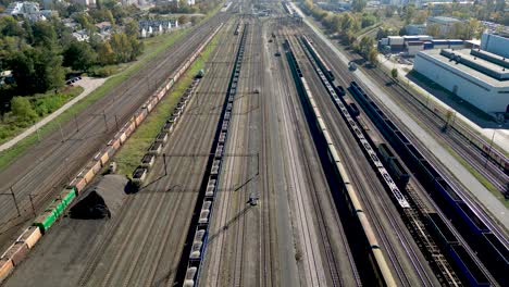 Aerial-view-of-shipping-containers,-semi-trucks-cargo-distribution-of-containers