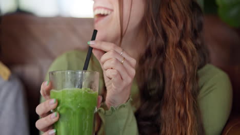 Smoothie,-drink-and-hands-of-woman-in-restaurant