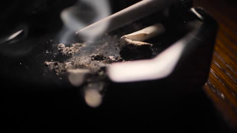 Close-up-smoking-cigarette-on-man-hand