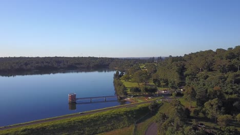 Aerial-view-of-Prospect-Reserve-Reservoir-water-catchment-with-a-unique-Jetty,-river-and-mini-water-dam-monitoring-system