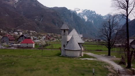 Dronehsot-of-a-Church-in-the-Alps