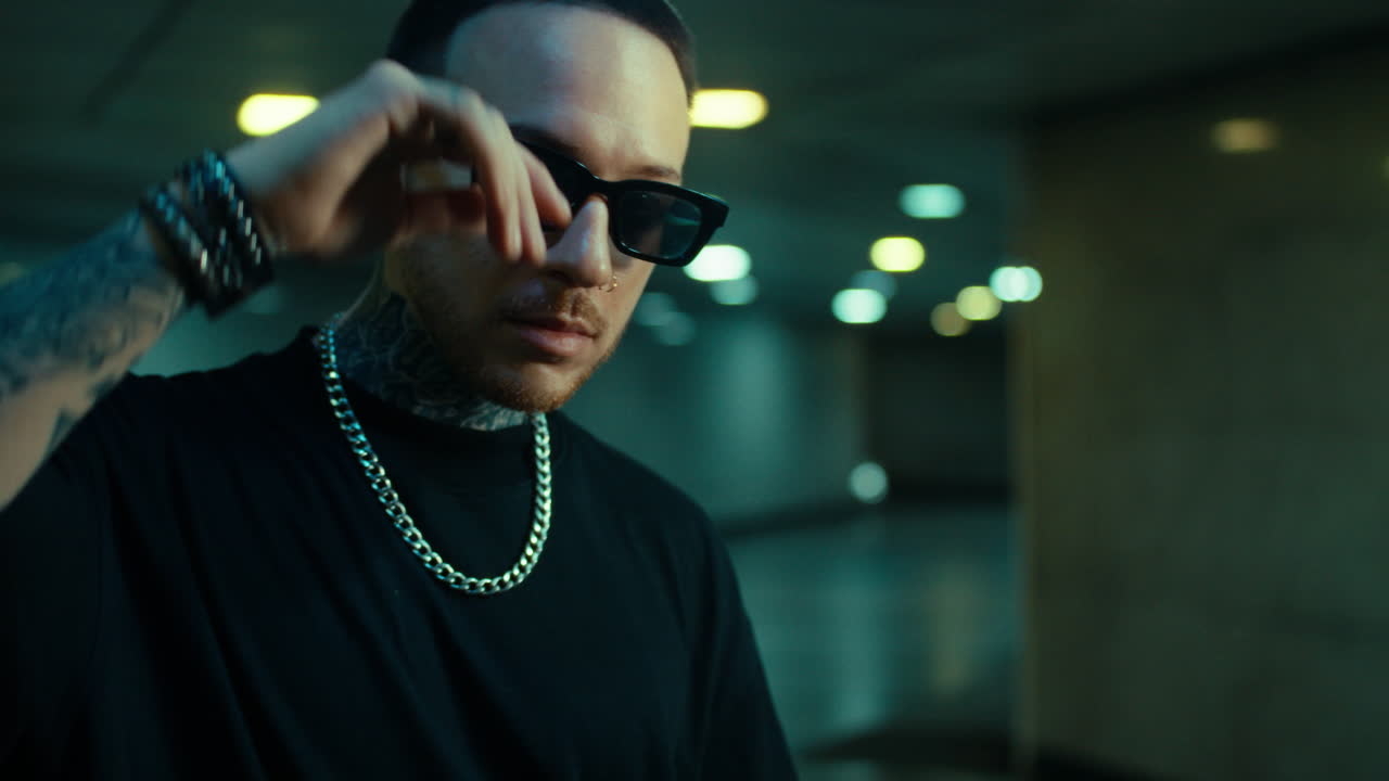 Stylish Man in Underground Passageway