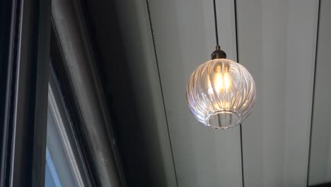 a close-up of a hanging light bulb