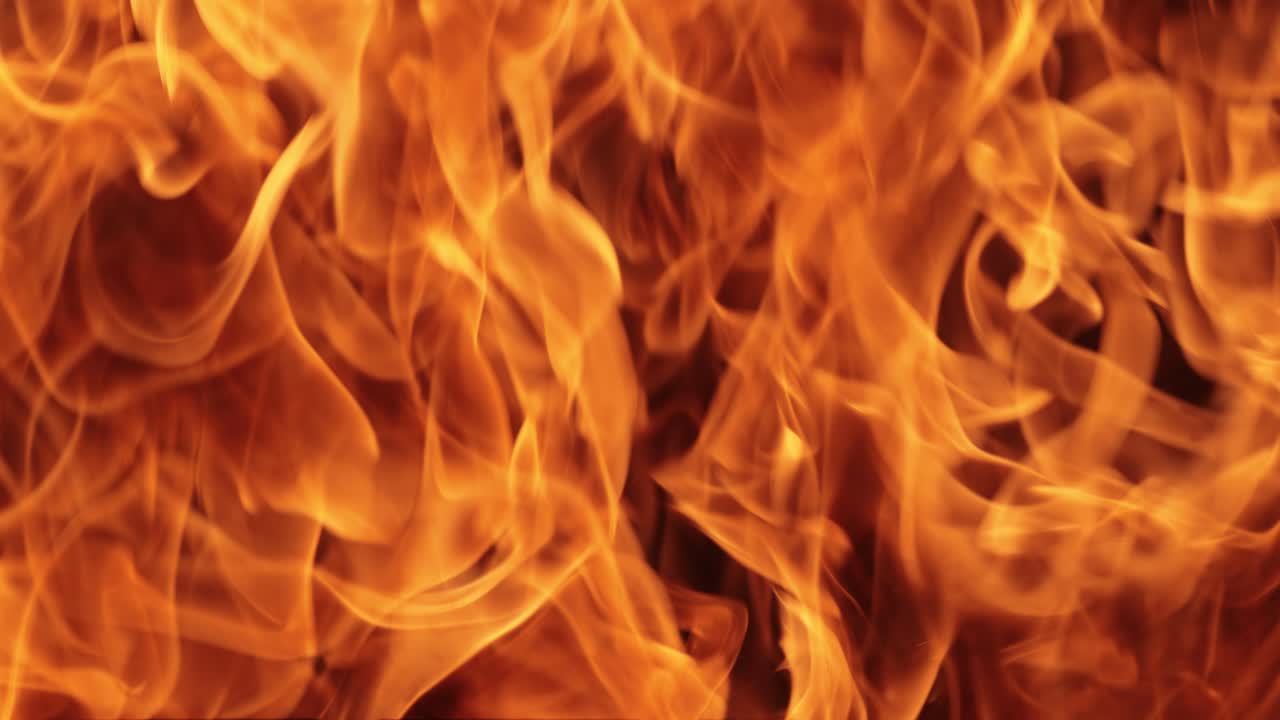 Flames of fire on black background in slow motion