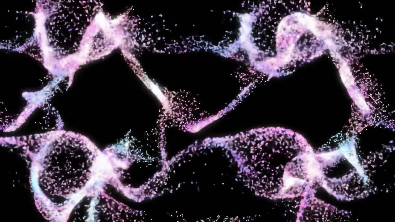 Swirling particles dance in vibrant colors against a dark background, creating a captivating display of abstract patterns. The animation showcases fluid movement and intricate designs.